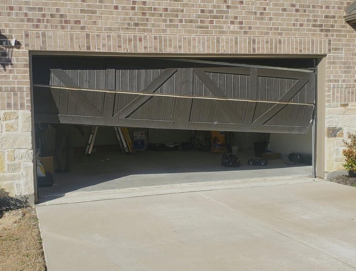 Can A Garage Door Open By Itself GuseHahn Garage Doors